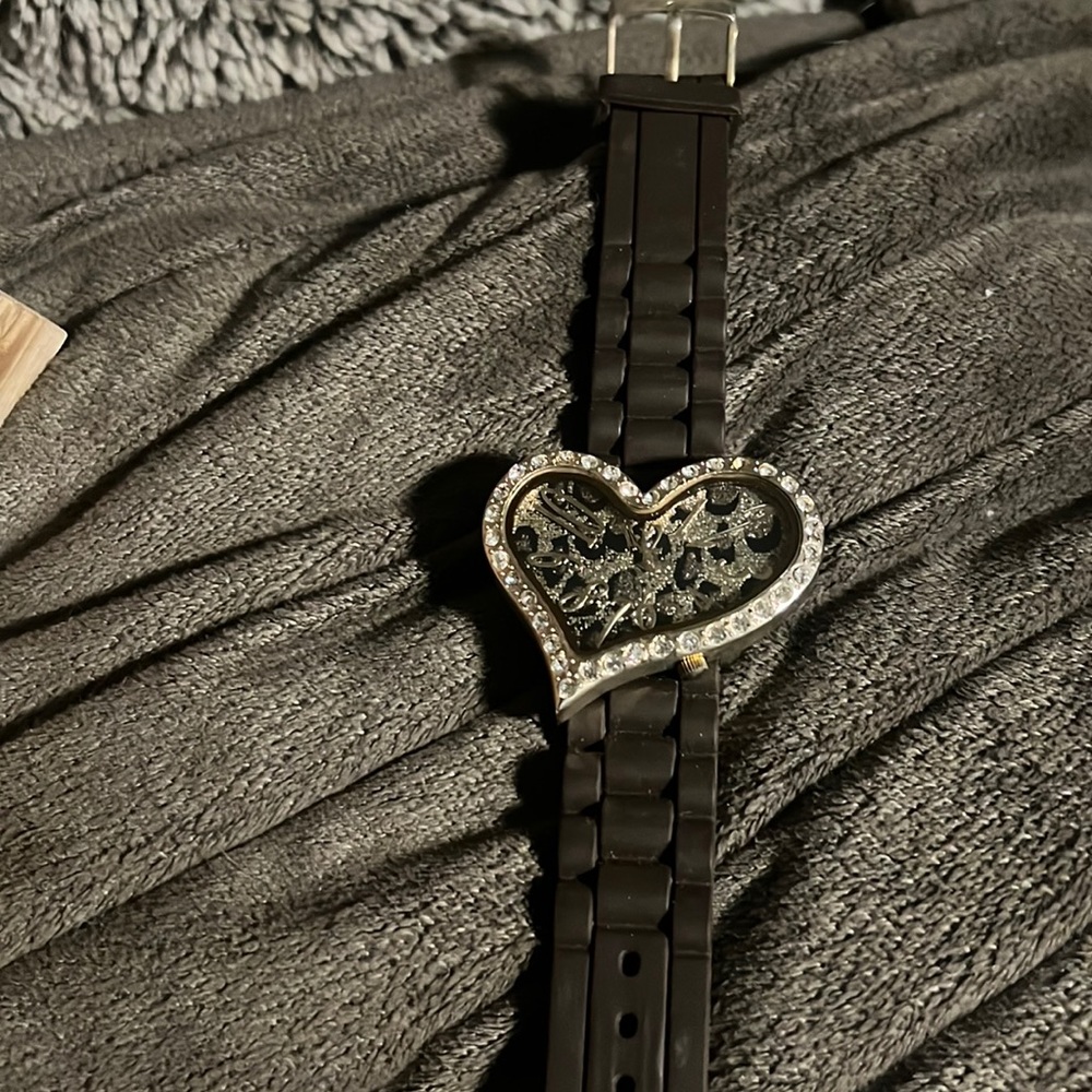 Barely wore. Little gem is missing
